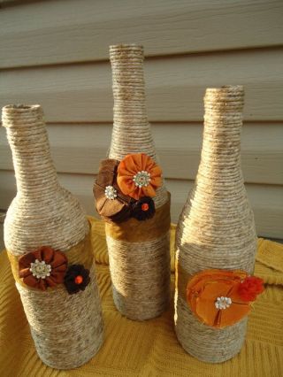 Wrap your bottles in yarn and decorate however you want!