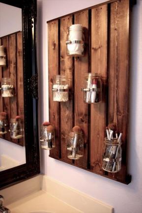 Mason jars attached to a wood pallet can be incorporated into various places in your home! Supplies needed for this craft are mason jars, hose clamps, wood, screws, drill, and a picture hanging kit. Steps: 1. Use a drill bit to get a hole started in the wood, where you’ll eventually screw in the hose clamp. 2. Also use the drill to put a hole in the hose clamp 3. After you’ve created the hole in the wood and the hole in the hose clamp, line them up and drill the hose clamp into the wood. 4. Slip the mason into the clamps and tighten until secure. 5. To hang it up, nail two hangers on the backside of the wood. VOILA! 